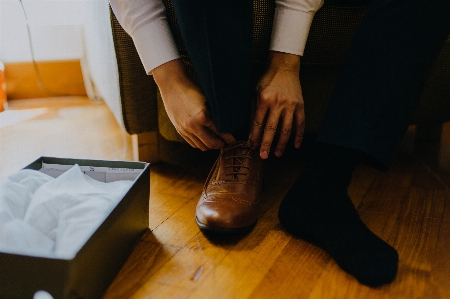 Hand shoe male leg Photo