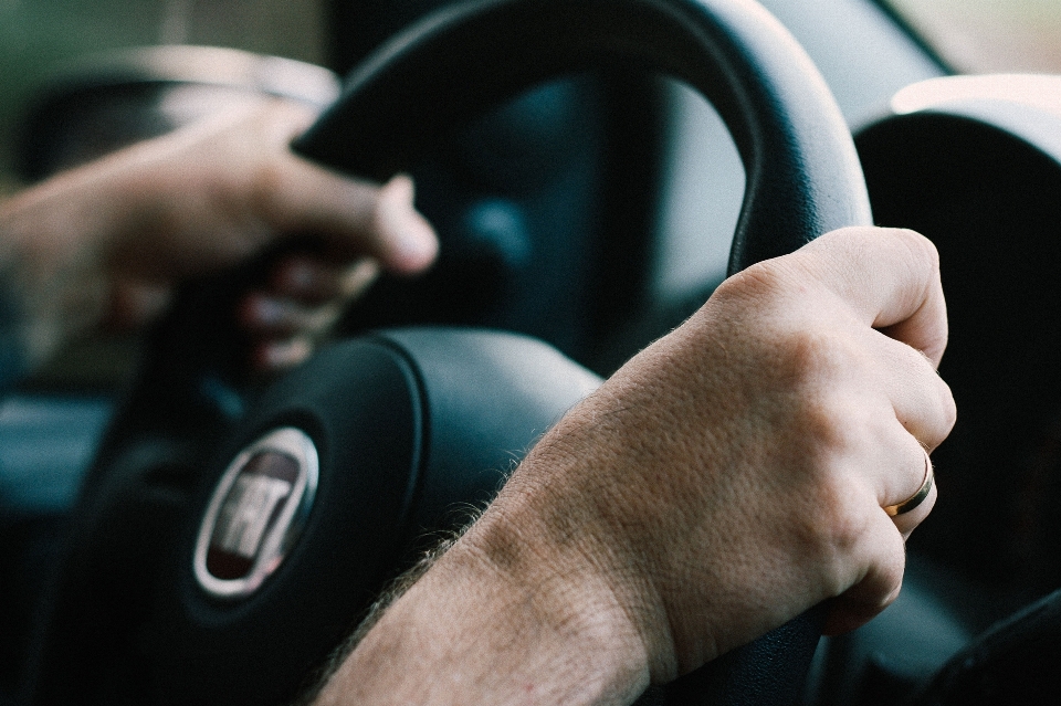 Hand person blur car