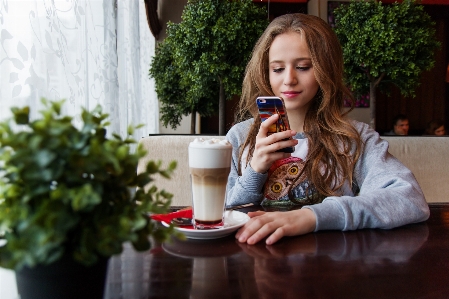 Smartphone table person cafe Photo