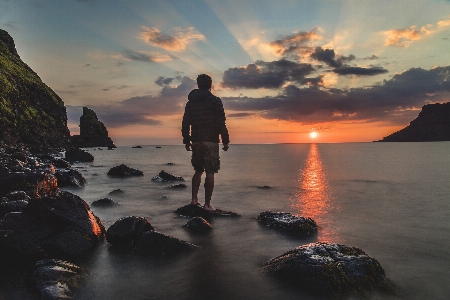 Man beach sea coast Photo