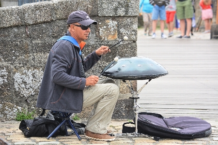 Man walking music road Photo