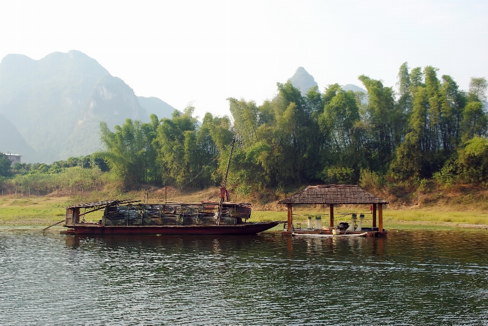 Mist boat house lake