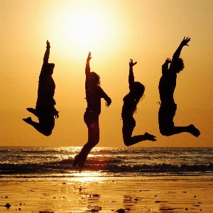 Beach ocean silhouette group Photo