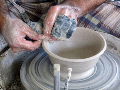 Hand wheel pottery art Photo