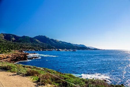 Foto Pantai lanskap laut pesisir