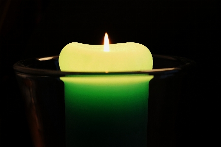 Light green flame darkness Photo