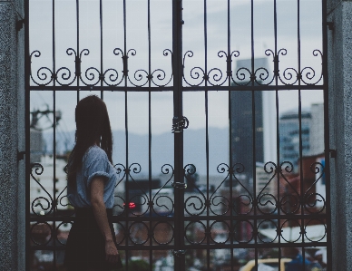 Girl window glass building Photo