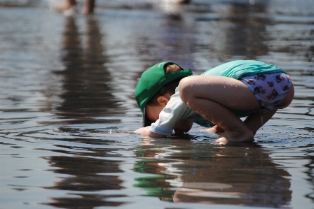 Foto Agua gente jugar niño