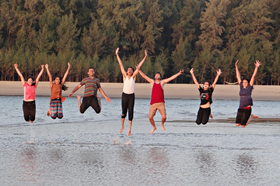 Beach jumping happy sports