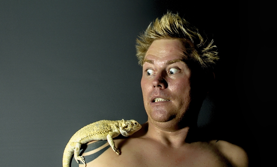 Man portrait reptile lizard