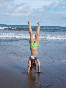 Hand beach sea water Photo