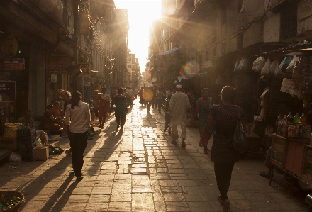 Pedestrian people sun sunset Photo