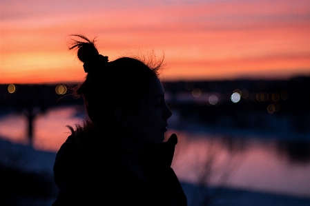 Silhouette person light hair Photo