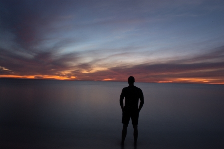 Man beach sea coast Photo