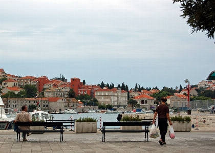 Sea water people boardwalk Photo