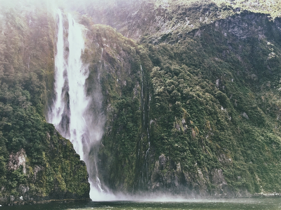 Waterfall mountain cliff green