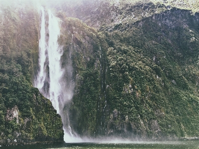 Waterfall mountain cliff green Photo