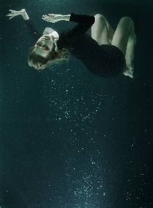 Water woman dark diving Photo