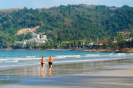 Man beach sea coast Photo