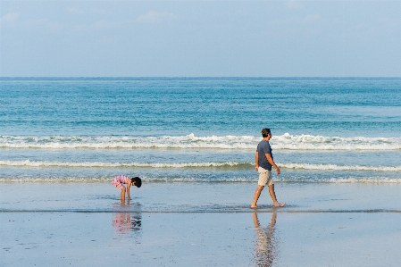 Man beach sea coast Photo