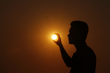 Hand man beach sea Photo