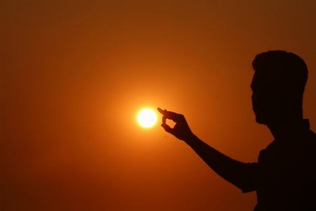 Hand man beach sea Photo