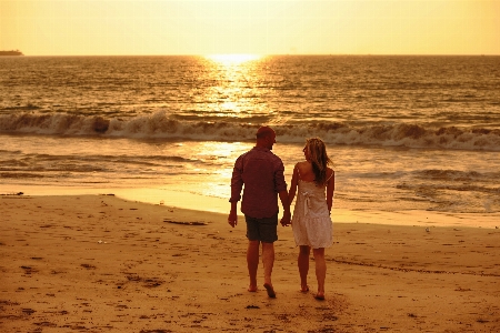 Foto Tangan pantai laut pesisir