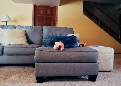 Person floor home living room Photo