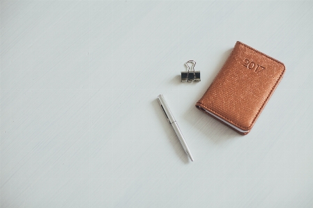 Writing hand leather pen Photo