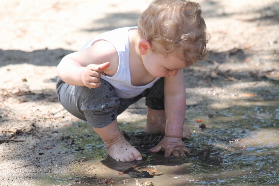 Nature person play mud