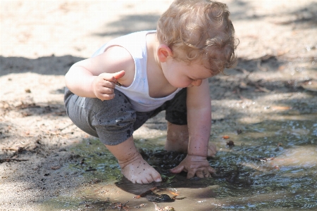 Nature person play mud Photo