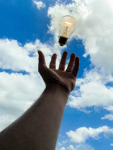 Hand light cloud sky Photo