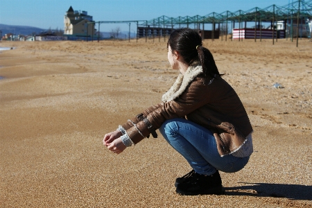 砂 女の子 太陽 人間の位置
 写真