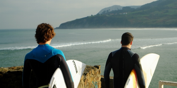 Man beach sea coast Photo