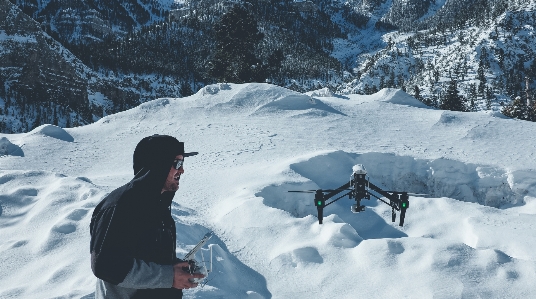 Man mountain snow winter Photo