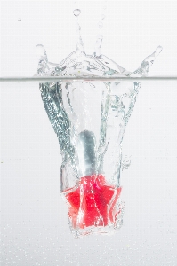 Photo Eau vague verre rouge