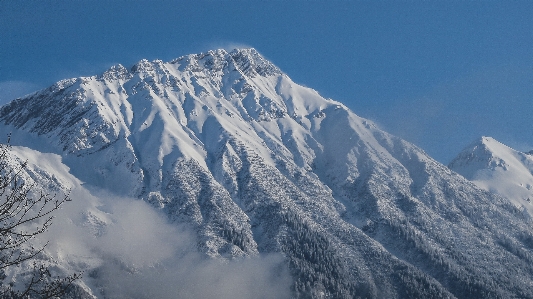 Foto Montanha neve inverno cadeia de montanhas
