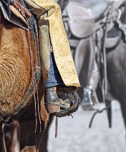 Frau leder bauernhof stiefel Foto