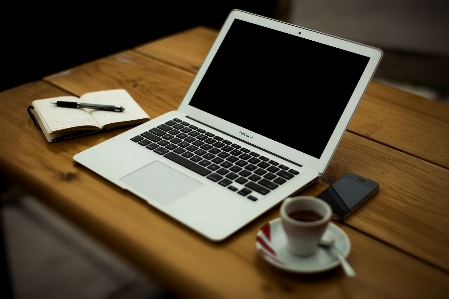 Laptop iphone desk notebook Photo