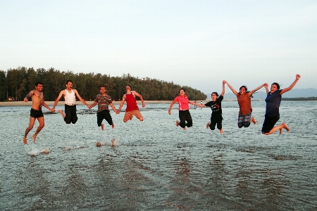 Beach jumping happy sports Photo