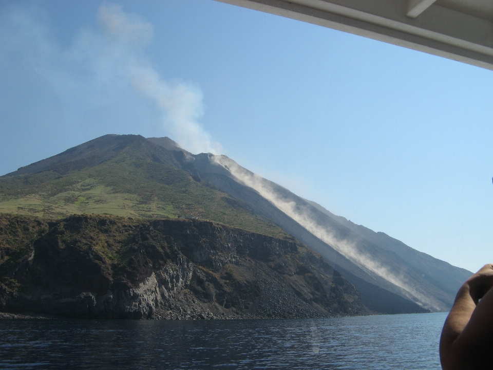 Sea coast mountain sky