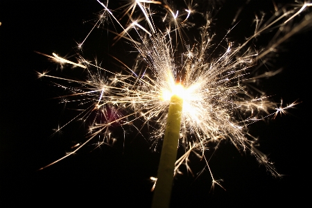 Glowing night sparkler colourful Photo