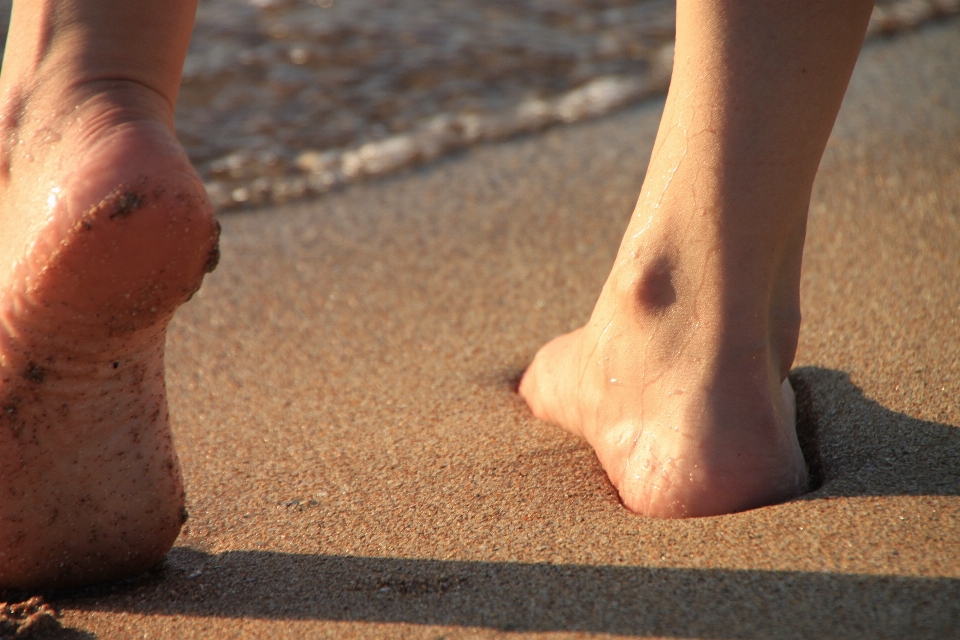 Hand beach sea water