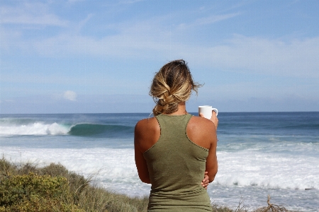 Shore sea woman beach Photo