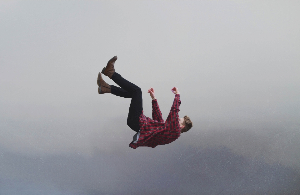 Action adult checkered shirt falling