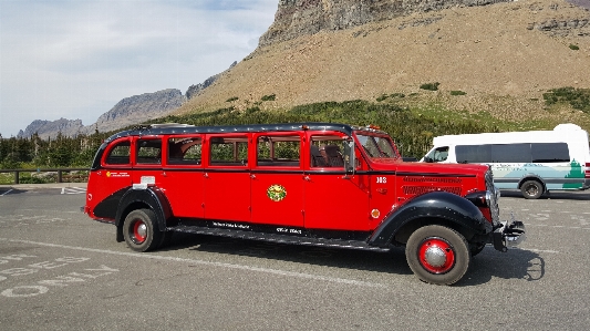 Glacier national park bus tour tourists Photo