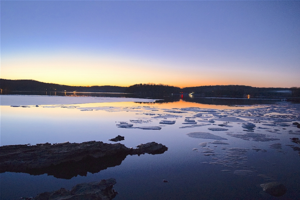 Lake sunset ice rock