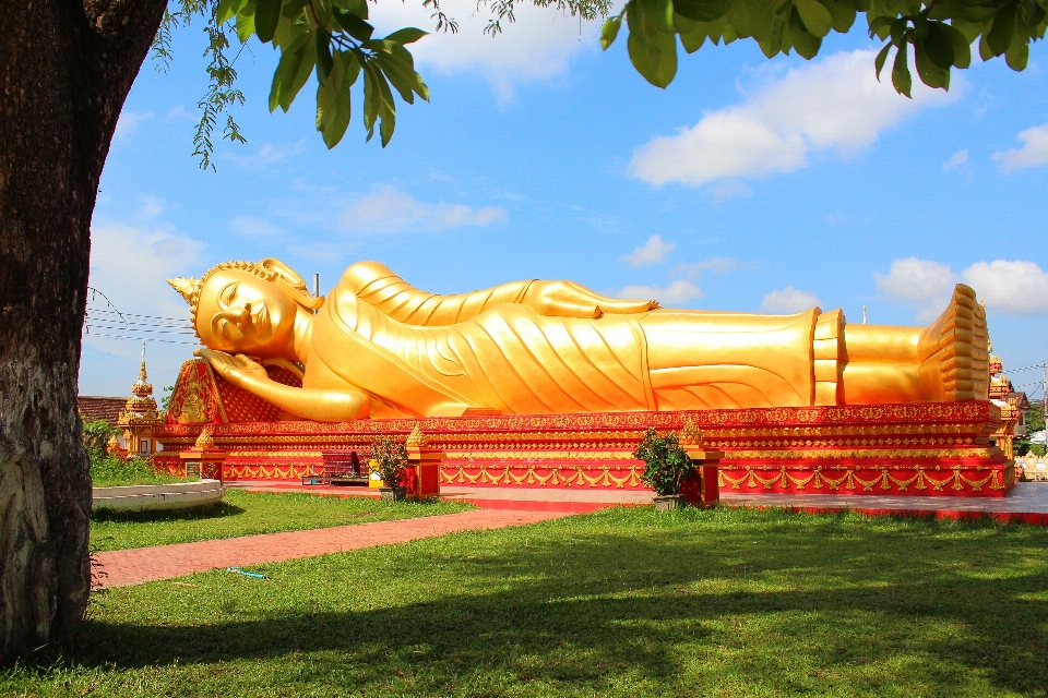 Reclining buddha laos temple buddhism