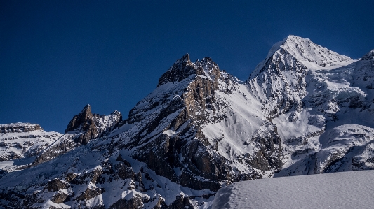 Mountainous landforms mountain range snow Photo