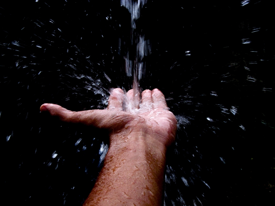 Hand water night rain